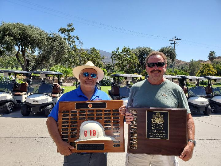 B Flight Net and Gross Champions Sergio Perez and Tom Teora